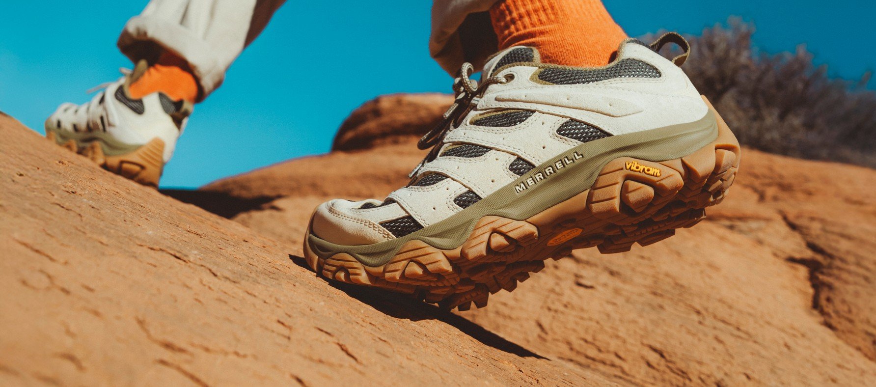 Close-up of Merrell Moab 3 hiking shoes on red desert rock